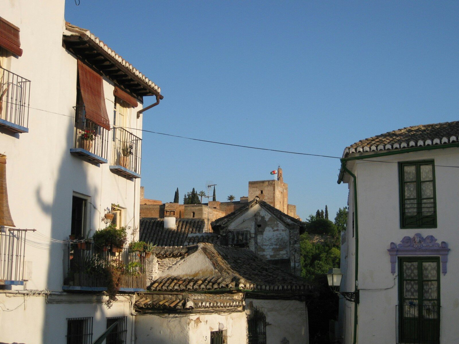 a group of buildings with a blue sky